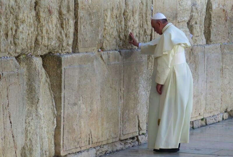 Francis praying at the Western Wall in Jerusalem on his 2014 visit to the Holy Land
